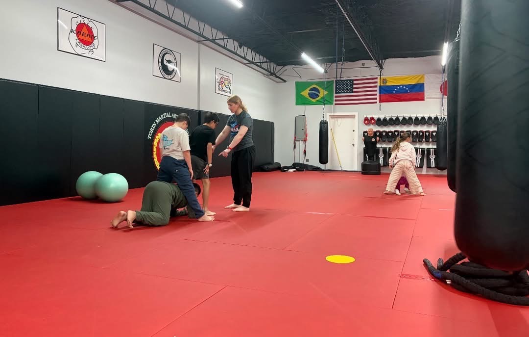 Inclusive martial arts class on the mat